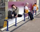 Passengers forming &#039;bookends&#039; on bench at Derby Railway Station. 20 April 2019 - STREET gallery